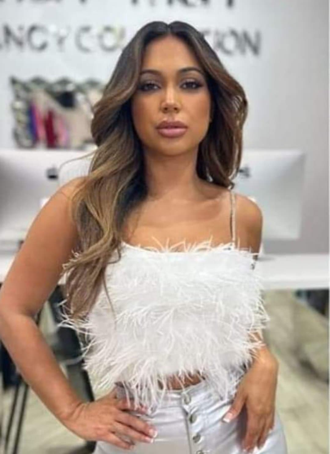 Top with feather details